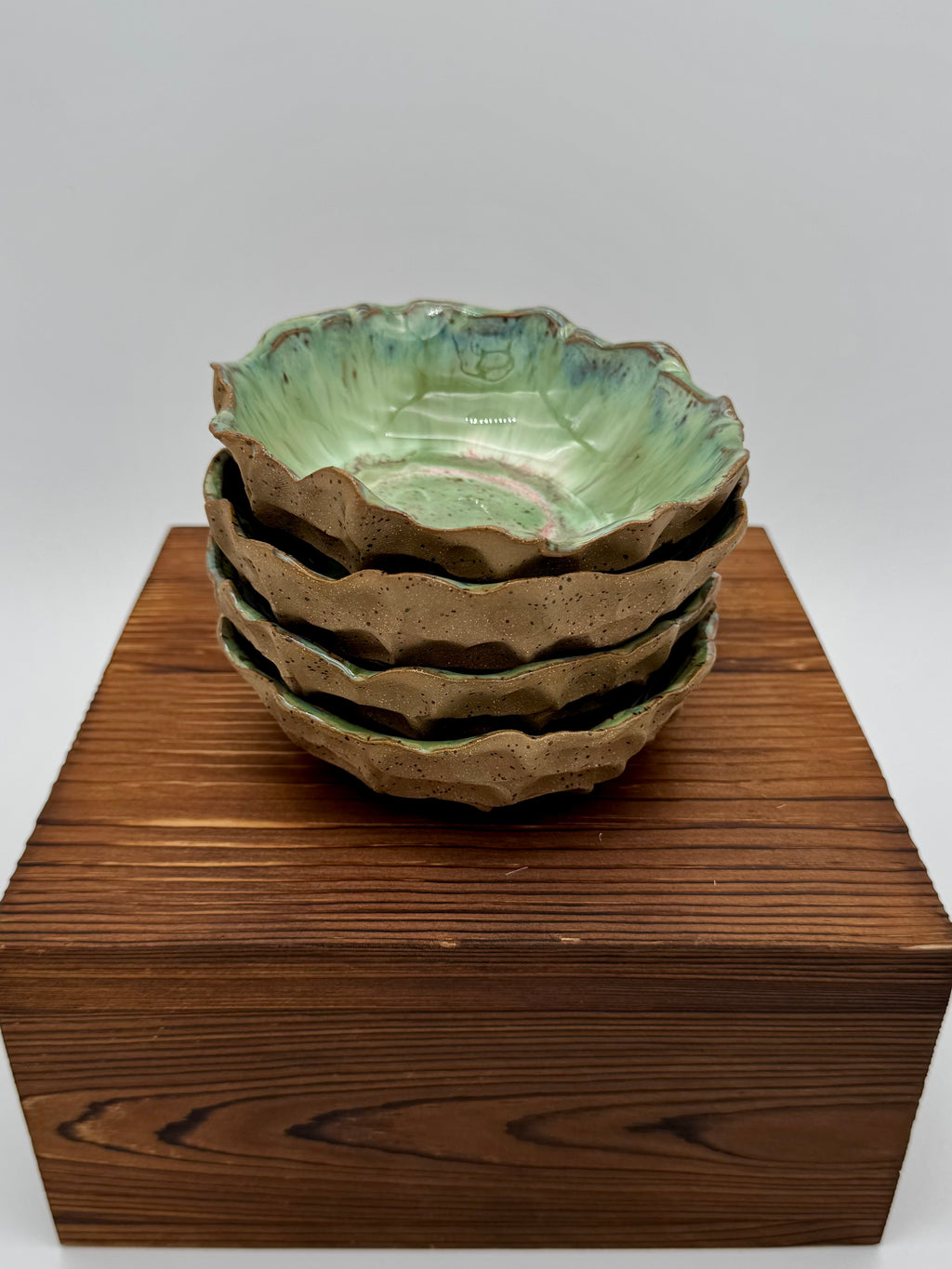 Four coordinating bowls shown together; individual listing includes one bowl